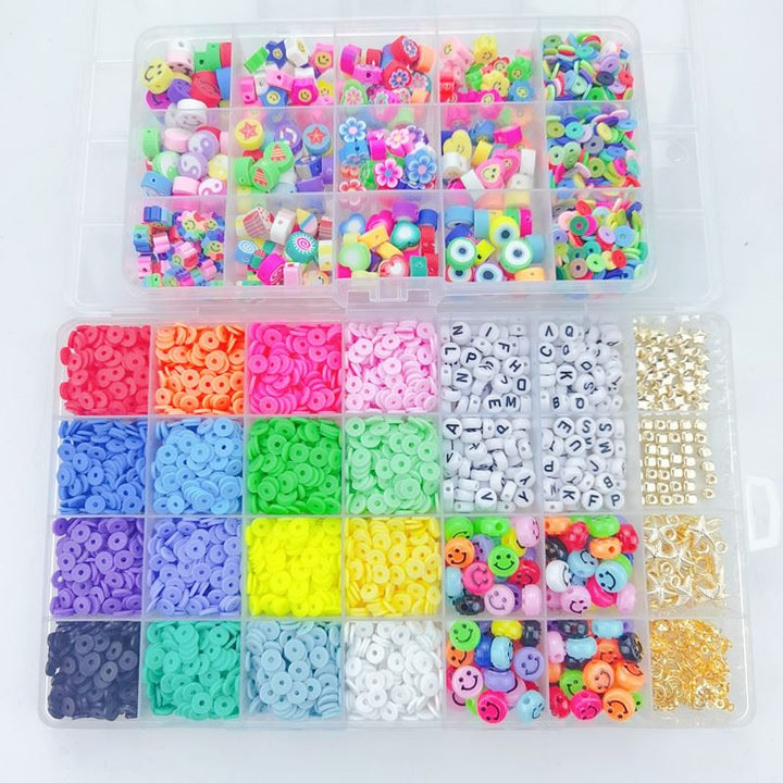 The Fashiongirl Clay Beads / Heishi Beads Fimo Kit - KREA DIY Jewellery Kit includes 4500 colorful beads with letters, smiley faces, flowers, and geometric shapes, all organized by type and color in a plastic box—ideal for jewellery making.