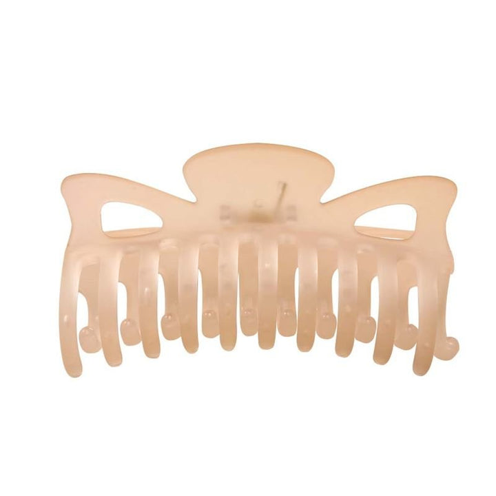 The SOHO Jelly Hair Claw in beige by SOHO features wide teeth, two triangular side cutouts, and a strong grip for all hair types. Made of plastic, it's shown against a white background.