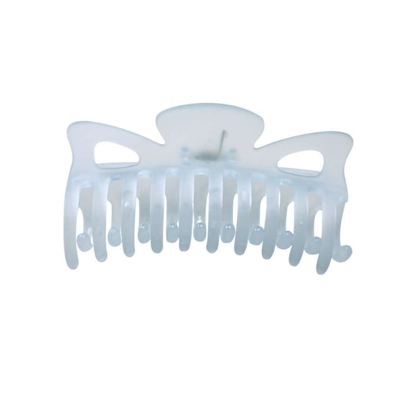 The SOHO Jelly Hair Claw in Cool Blue by SOHO is a translucent light blue plastic clip with curved prongs and a spring hinge, designed for a secure grip to hold all hair types in place.