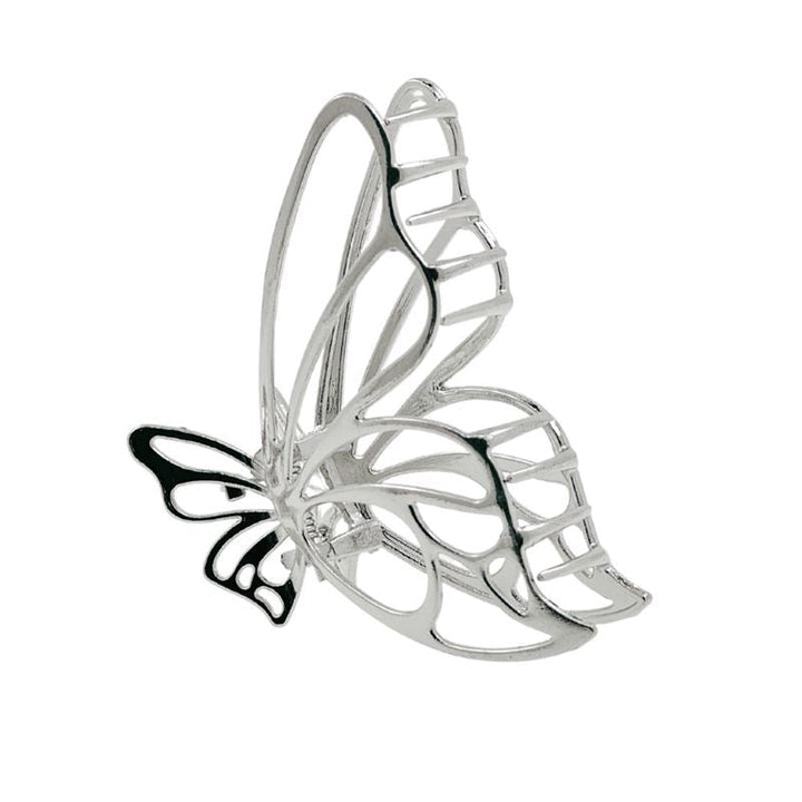 The SOHO Nabi Hair Claw - Silver by SOHO features intricately designed wings with open and solid black sections, adding elegance to any updo. This metal clip blends style and function, shown here against a white background.