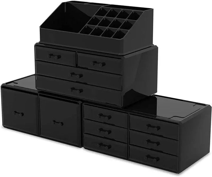The UNIQ XXL Organiser in black features 12 drawers and 16 compartments, including a top section with open slots and cubbies, perfect for storing cosmetics or accessories.